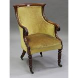 A William IV mahogany tub back library armchair, upholstered in green velour, the scroll arms carved