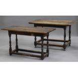 A 19th century oak centre table, the rectangular top raised on turned and block legs united by
