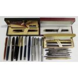 A group of fountain pens, including Targa by Sheaffer, other boxed Sheaffers and Parkers, together