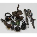 A small group of mainly silver objects of virtu, including an enamelled pendant model of an Egyptian