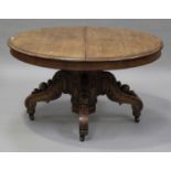 A late 19th century Continental oak circular centre table, the moulded top raised on an octagonal