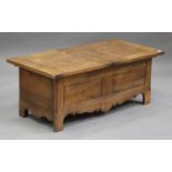 A modern oak coffee table with sliding top, on stile supports, height 58cm, width 120cm, depth