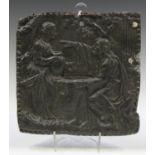 An 18th century lead plaque, cast in relief with a depiction of Rebecca at the Well within a