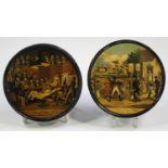 A 19th century papier-mâché circular snuff box, the lid printed with a scene titled 'R.A. of