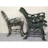 A pair of 20th century cast iron garden bench ends of foliate scroll form, height 76cm, together