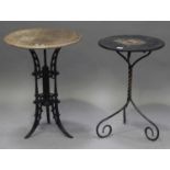 An early 20th century wrought metal circular occasional table with painted decoration, height