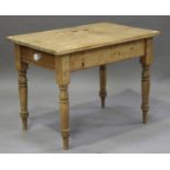 A Victorian stripped pine kitchen table, fitted with a drawer, on turned legs, height 76cm, width