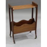 An Edwardian mahogany bookstand, on downswept block legs and brass castors, height 80cm, width 56cm,