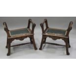 A pair of early 20th century Spanish walnut Aesthetic style window seats with incised decoration,