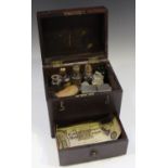 A George III mahogany apothecary's chest, the hinged lid with gilt brass handle, enclosing later
