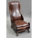 A William IV mahogany showframe rocking chair, the seat and back upholstered in dark brown