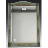 An early 20th century pale green chinoiserie decorated dressing table mirror, the arched frame