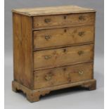 A George III pine chest of four long graduated drawers, on shaped bracket feet, height 100cm,
