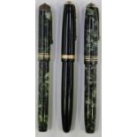 A Conway Stewart 58 fountain pen with 14ct gold nib and green plastic case, a Conway Stewart 388