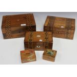 A group of three Victorian walnut work boxes, all with geometric inlaid bands, width of largest