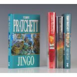PRATCHETT, Terry. Jingo. London: Gollancz, 1997. First edition, signed by the author to the title-