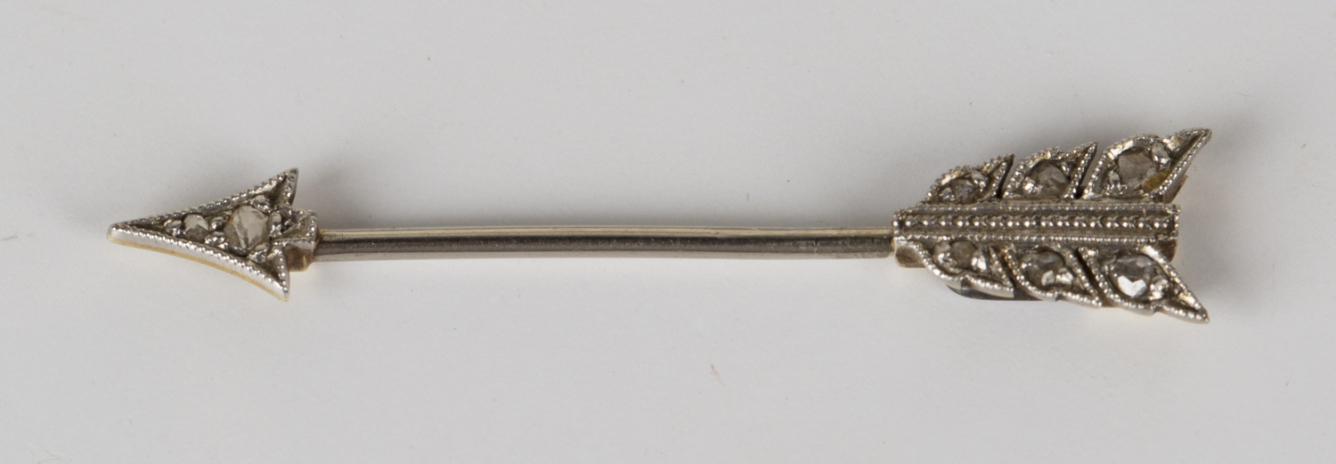 A rose cut diamond set jabot pin, circa 1920, designed as an arrow, length 3.3cm, with a case.