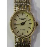 A Rotary Quartz 9ct gold oval cased lady's bracelet wristwatch, the signed gilt dial with gilt baton