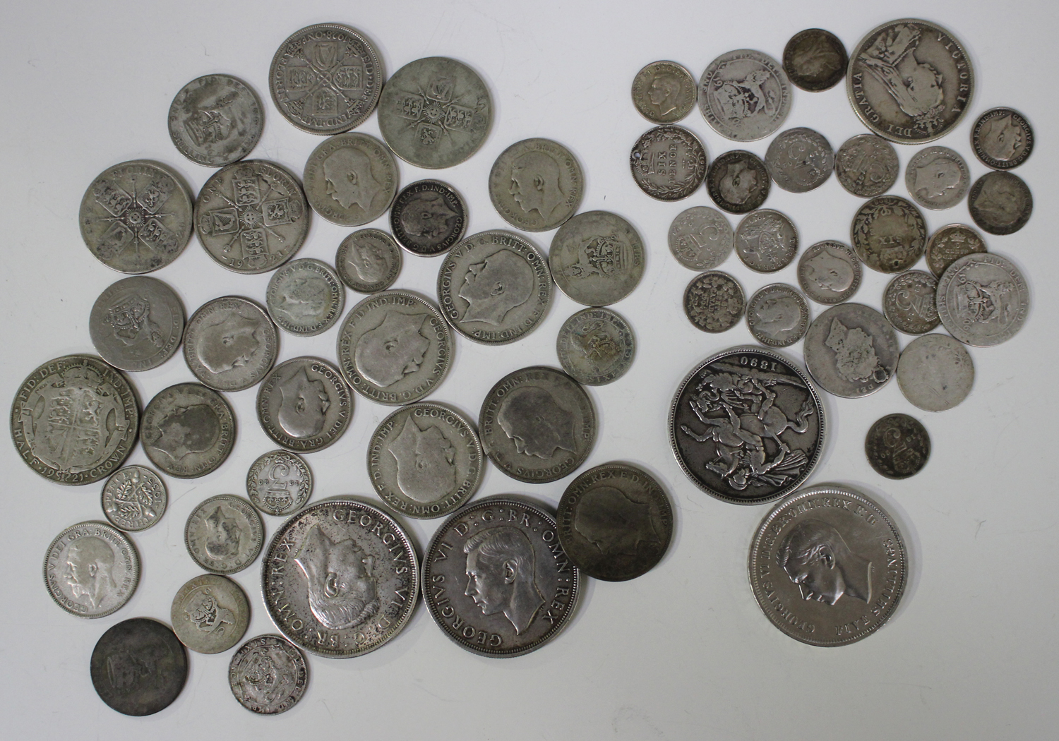 A small group of British pre-1920 silver coins, including a Victoria Jubilee Head crown 1890, and