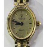 A Vicence Quartz 9ct gold lady's bracelet wristwatch, the signed oval gilt dial with baton hour