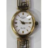 A Rotary Elite 9ct gold lady's bracelet wristwatch, the signed oval white dial with gilt baton