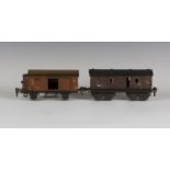 Two Märklin gauge O 1st/3rd coaches 2873 and a luggage car 2872, all finished in LMS maroon and