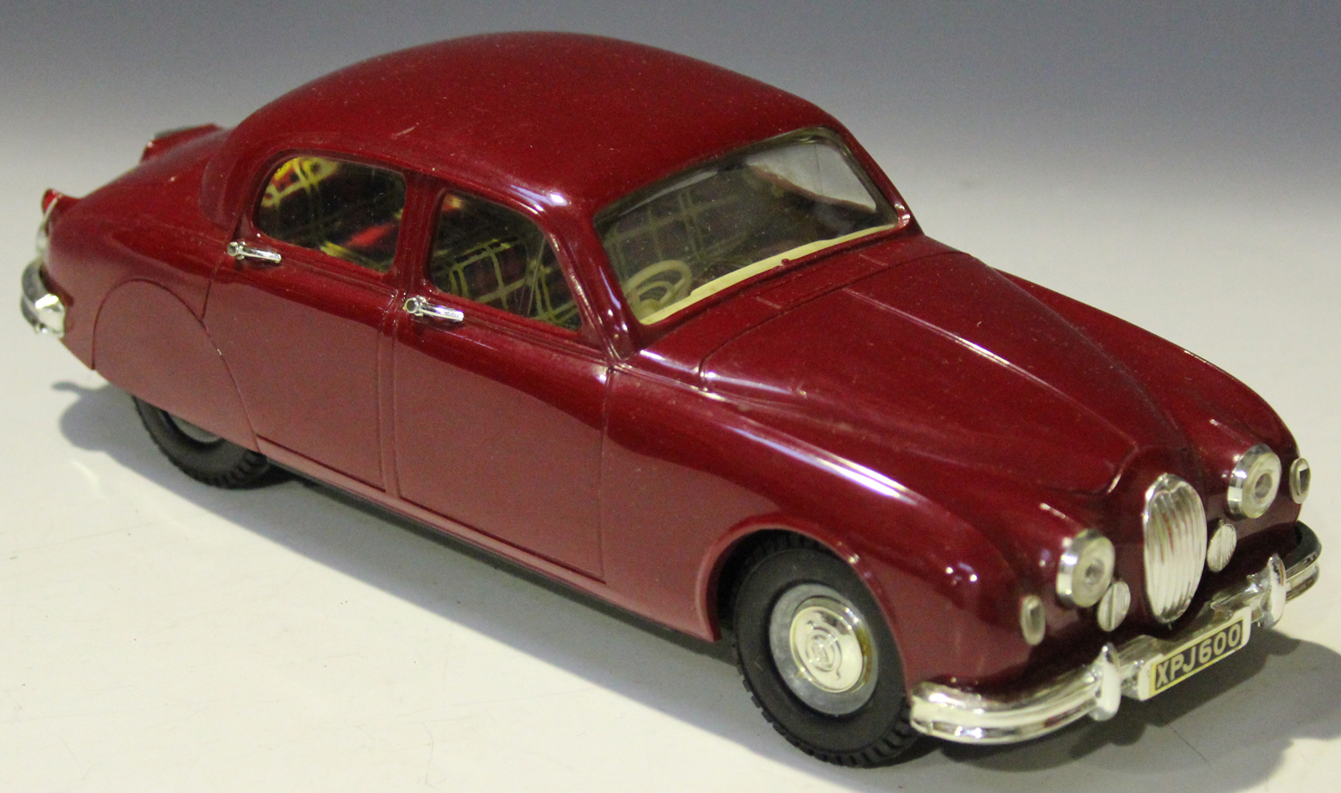 A Tri-ang electric 1:20 scale 2.4 litre Jaguar, finished in maroon with silvered fittings, boxed ( - Image 4 of 4