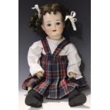 A Porzellanfabrik Mengersgereuth bisque head doll, impressed 'P.M 23 8', with later brown wig,