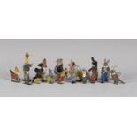 A collection of seventeen Britains and other Cococub lead figures, including Peter Pum Poodle,