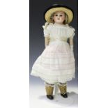 An Armand Marseille bisque head and shoulders doll, impressed '1894 AM 3/0 DEP', with blonde wig,
