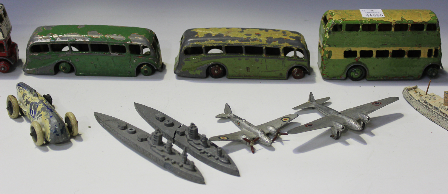 A small collection of Dinky Toys vehicles, comprising a pre-war No. 23A racing car, finished in - Image 3 of 4