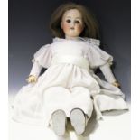 A Heubach Köppelsdorf bisque head doll, impressed '250-4', with later brown wig, sleeping blue eyes,
