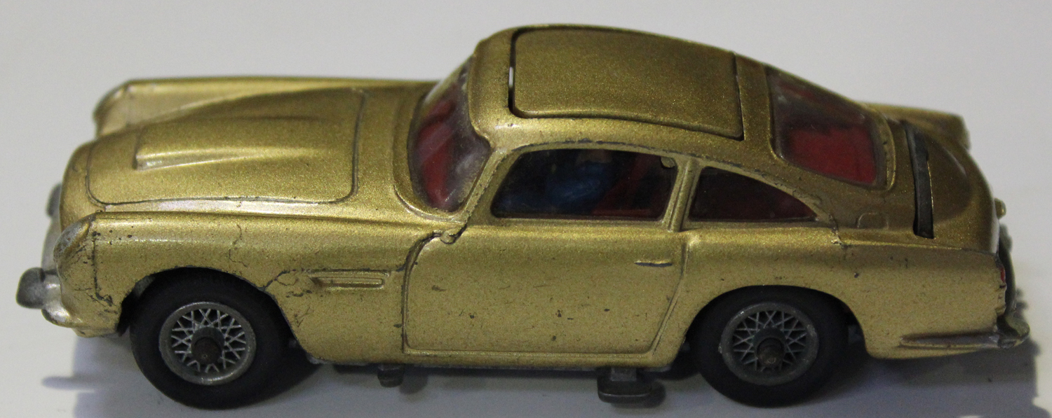 A Corgi Toys No. 261 James Bond's Aston Martin D.B.5, boxed with diorama, two bandit figures, secret - Image 5 of 5