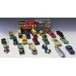 A collection of Dinky Toys cars, commercial vehicles and public transport vehicles, including a