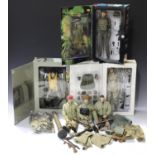 A small collection of action figures, comprising a WWII Eindhoven 1944 101st Airborne Division