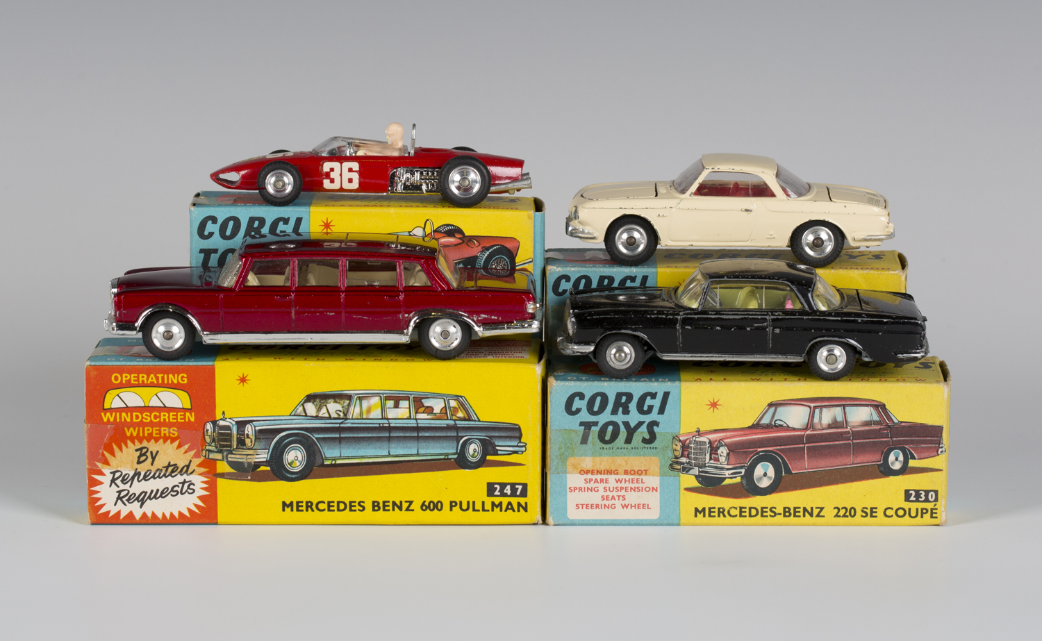 Four Corgi Toys cars, comprising a No. 154 Ferrari Formula 1, a No. 230 Mercedes-Benz 220 SE