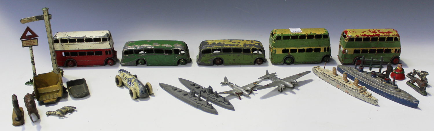 A small collection of Dinky Toys vehicles, comprising a pre-war No. 23A racing car, finished in