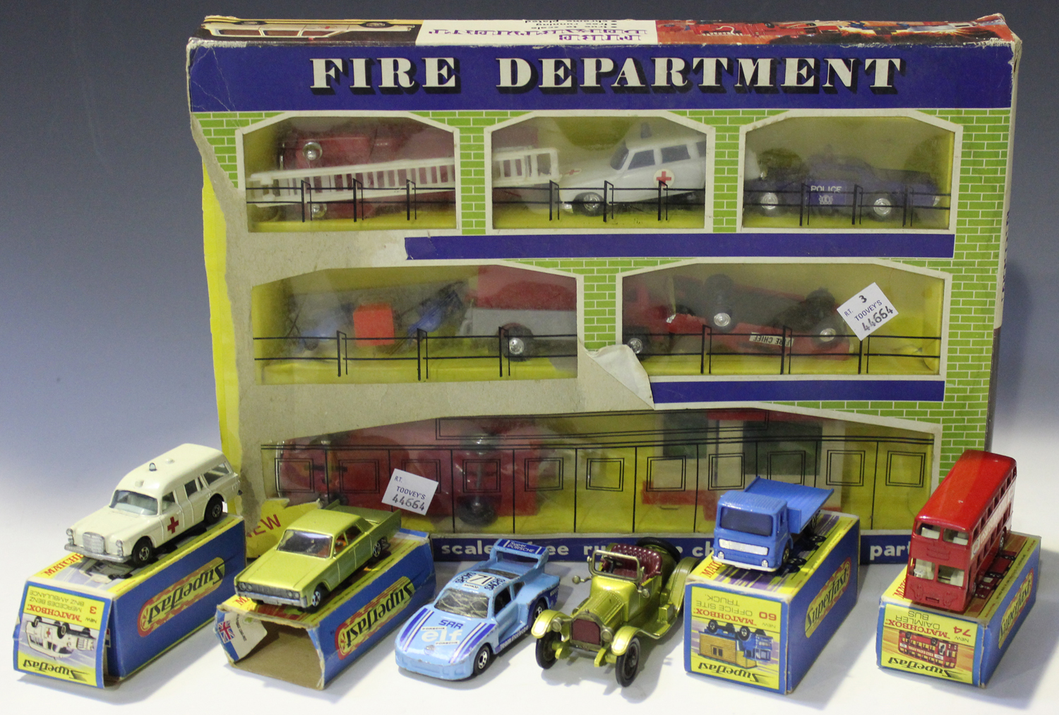 Four Matchbox Superfast vehicles, comprising a No. 3 Mercedes-Benz Binz ambulance, a No. 31