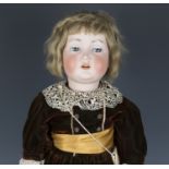 A Simon & Halbig Keisner & Rheinhard bisque head doll, impressed '117, 62', with brown wig, sleeping