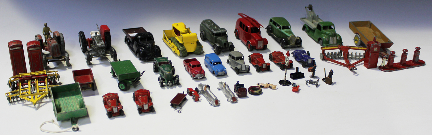 A collection of die-cast vehicles, including a Dinky Toys post-war No. 25D petrol tanker, a No.