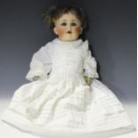 A German bisque head doll, impressed 'Q5 201', with later wig, closing blue eyes, open mouth showing