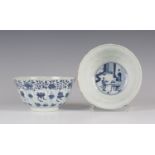 A pair of Chinese blue and white porcelain bowls, Kangxi period, of moulded circular form, each