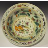 A Chinese famille rose porcelain circular basin, late Qing dynasty, the interior painted with