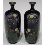 A pair of Japanese cloisonné hexagonal vases, Meiji period, each decorated with chrysanthemums on