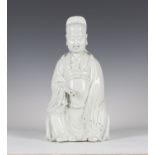 A Chinese blanc-de-Chine porcelain figure of Caishen, Kangxi style but late Qing dynasty, the god of