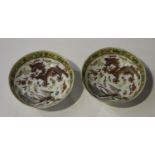 A pair of Chinese famille rose enamelled porcelain small circular dishes, mark of Guangxu and