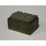 A Chinese celadon jade mounted brass rectangular box, 18th century and later, the jade top finely