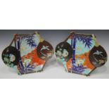 A pair of Japanese Imari porcelain dishes, Meiji period, each of shaped outline, painted with birds,