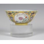 A Chinese yellow ground famille rose medallion bowl, mark and period of Daoguang, the exterior