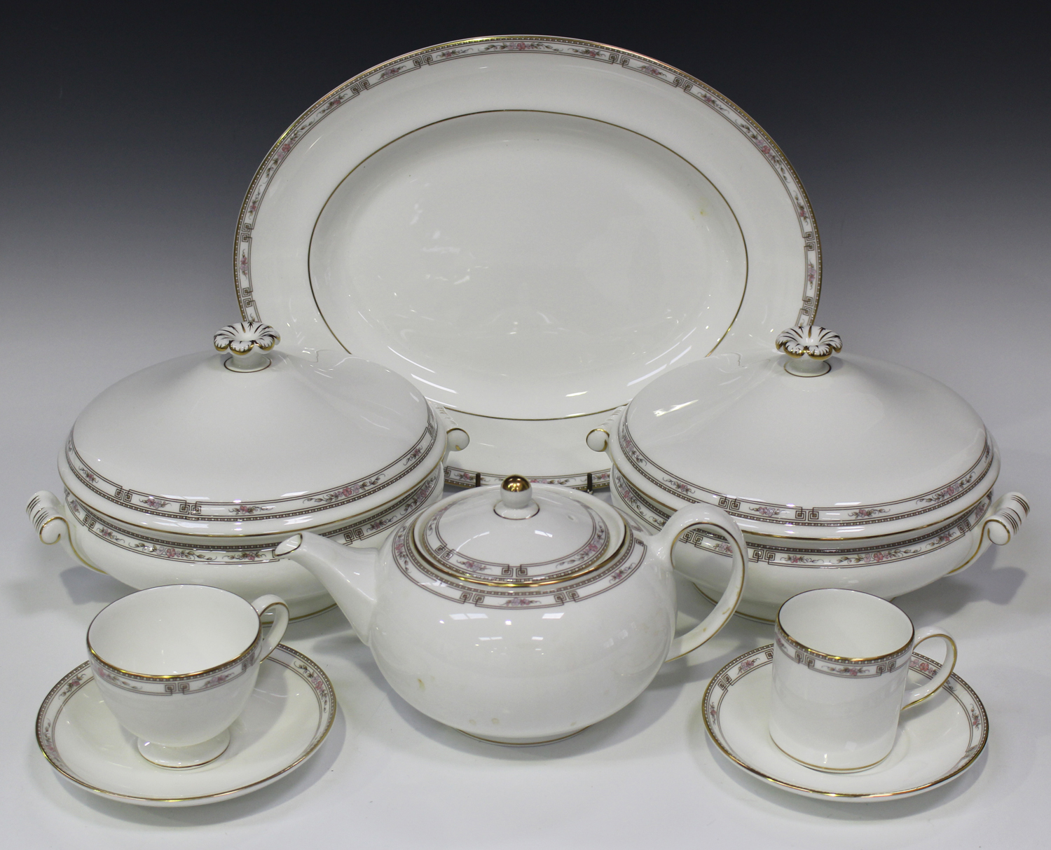 A Wedgwood bone china 'Colchester' pattern part service, comprising an oval platter, two tureens and